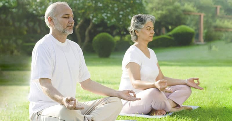 old people doing yoga